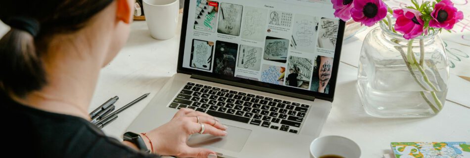 Photo Of Person Using Laptop For Graphic Designs